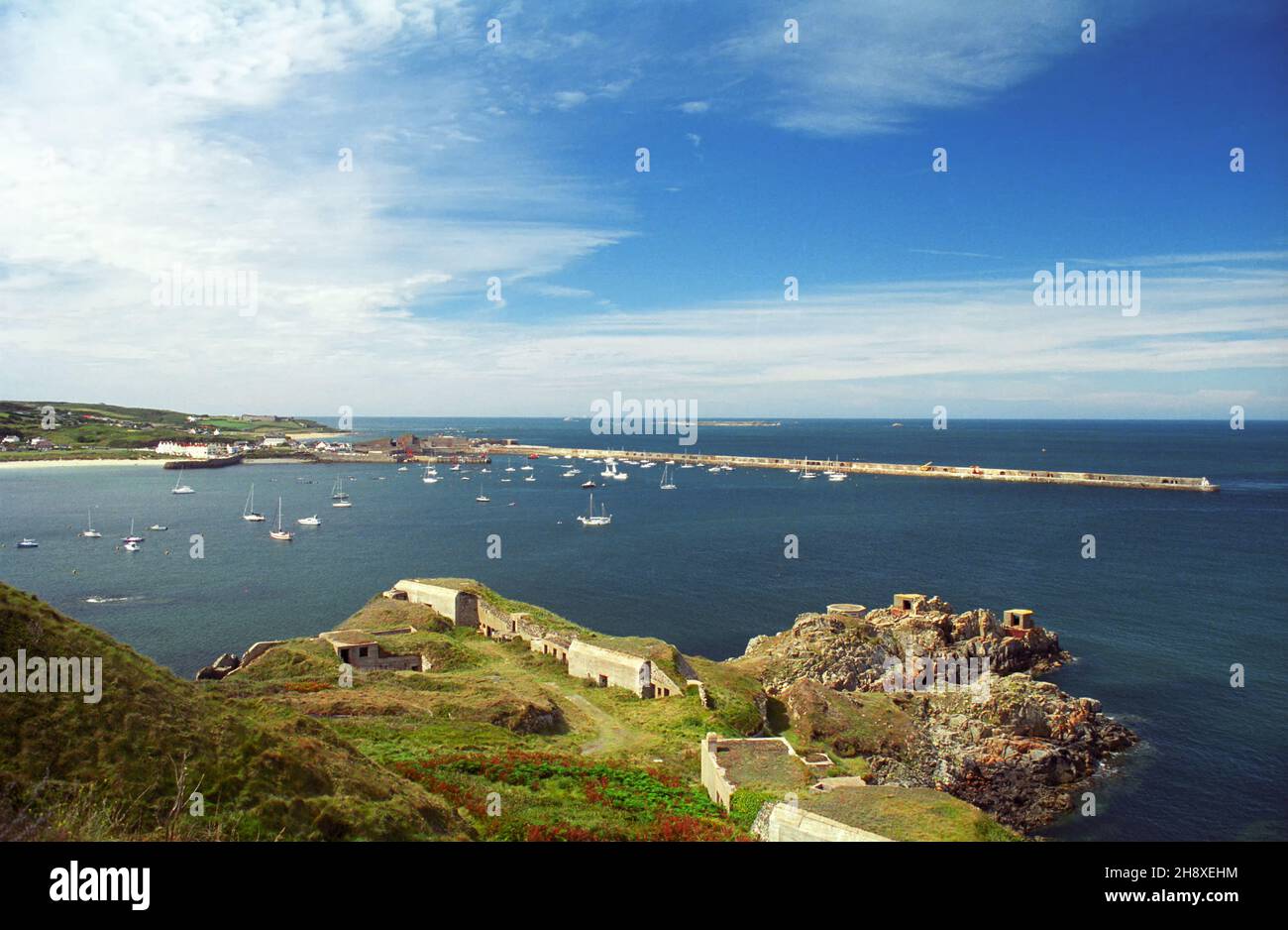 Fort Albert, Roselle Point and Braye Harbour with its great sea wall, Alderney, Channel Islands.  Film photograph, 2006 Stock Photo