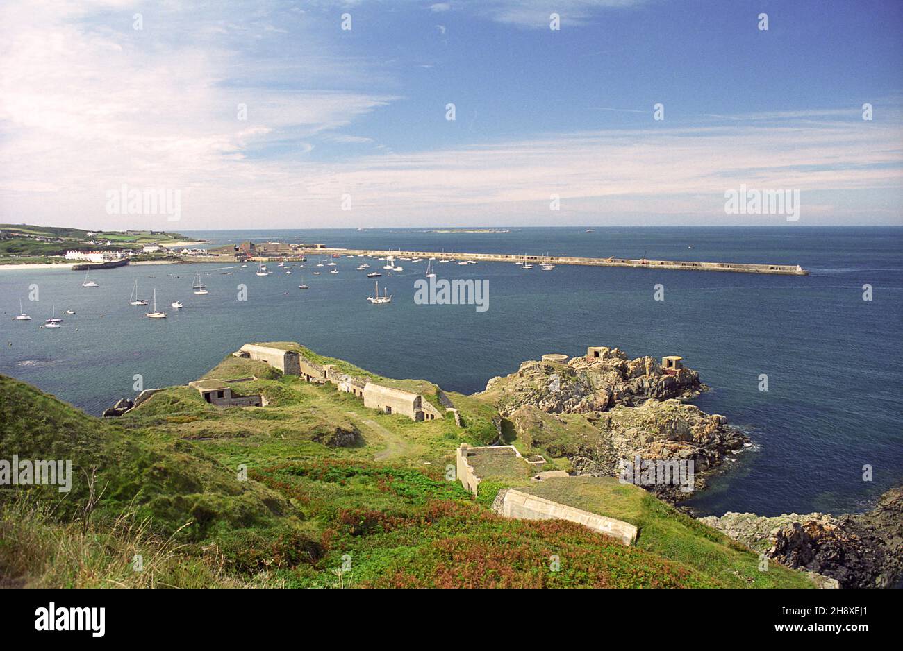 Fort Albert, Roselle Point and Braye Harbour with its great sea wall, Alderney, Channel Islands.  Film photograph, 2006 Stock Photo