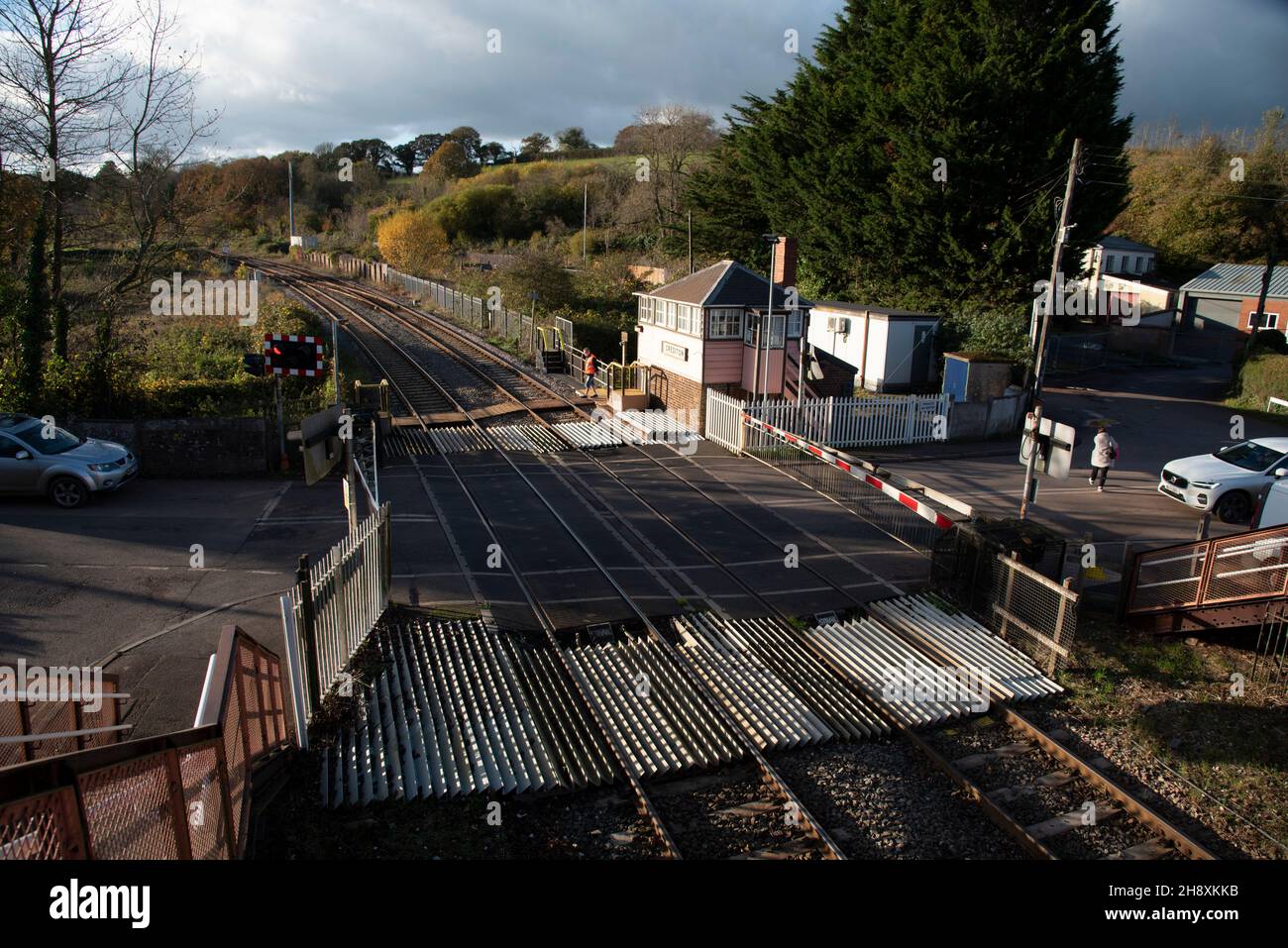Crediton, Devon, England. 2021. Overview of the level crossing barrier