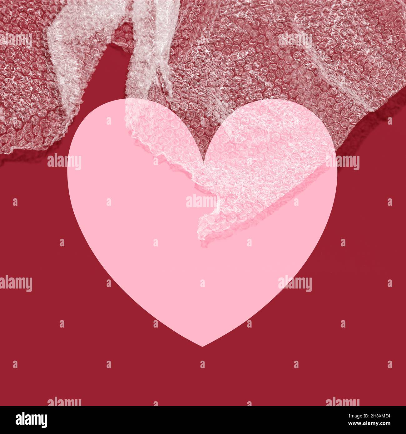 Pink bubble wrap in heart shape Stock Photo - Alamy