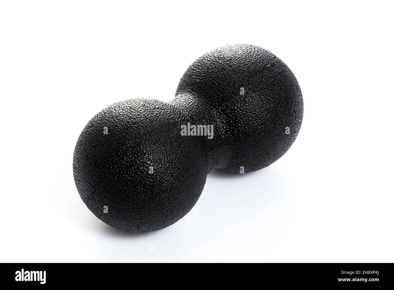 black double massage ball close-up for yoga on white isolated background Stock Photo