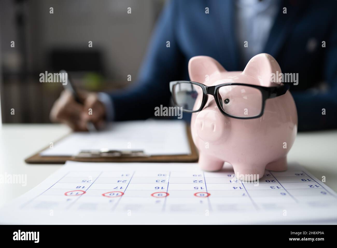 Piggybank Money Investment Schedule And Business Budget Stock Photo