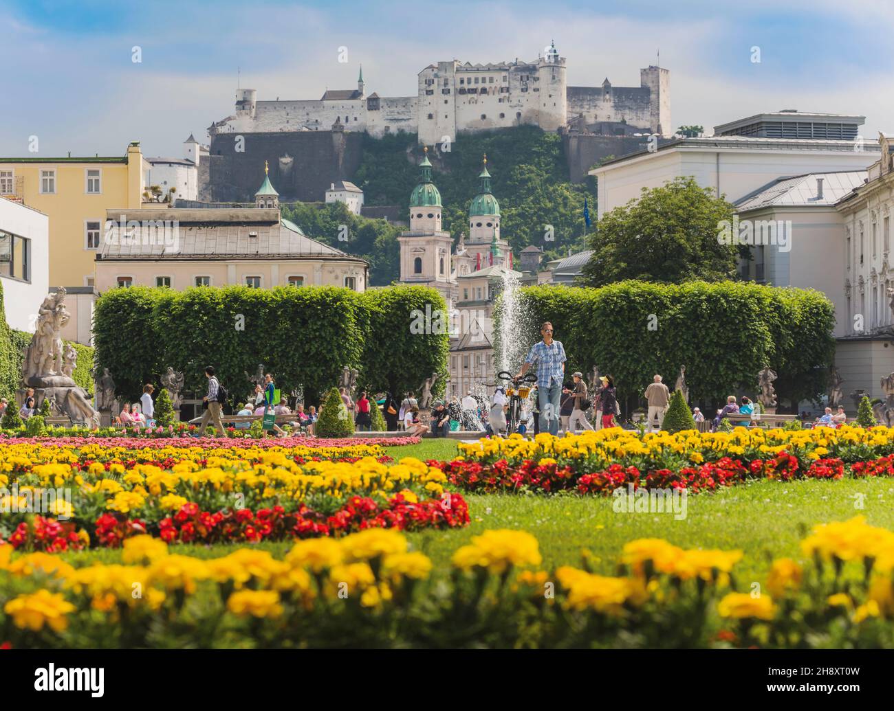 Salzburg, Salzburg State, Austria. View across the gardens of the Schloss Mirabell to the Hohensalzburg fortress. Stock Photo