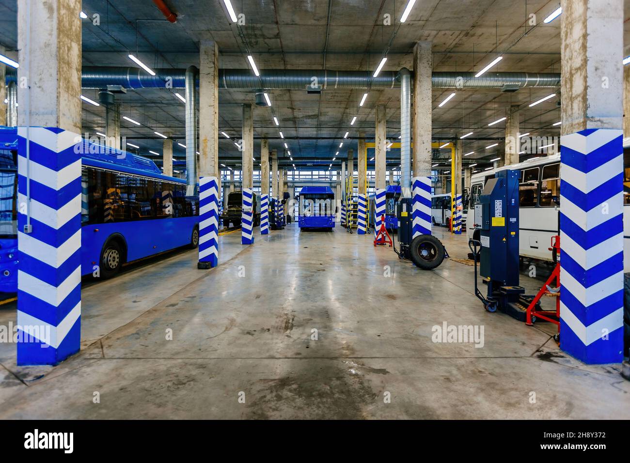 Buses in the modern repair service Stock Photo Alamy