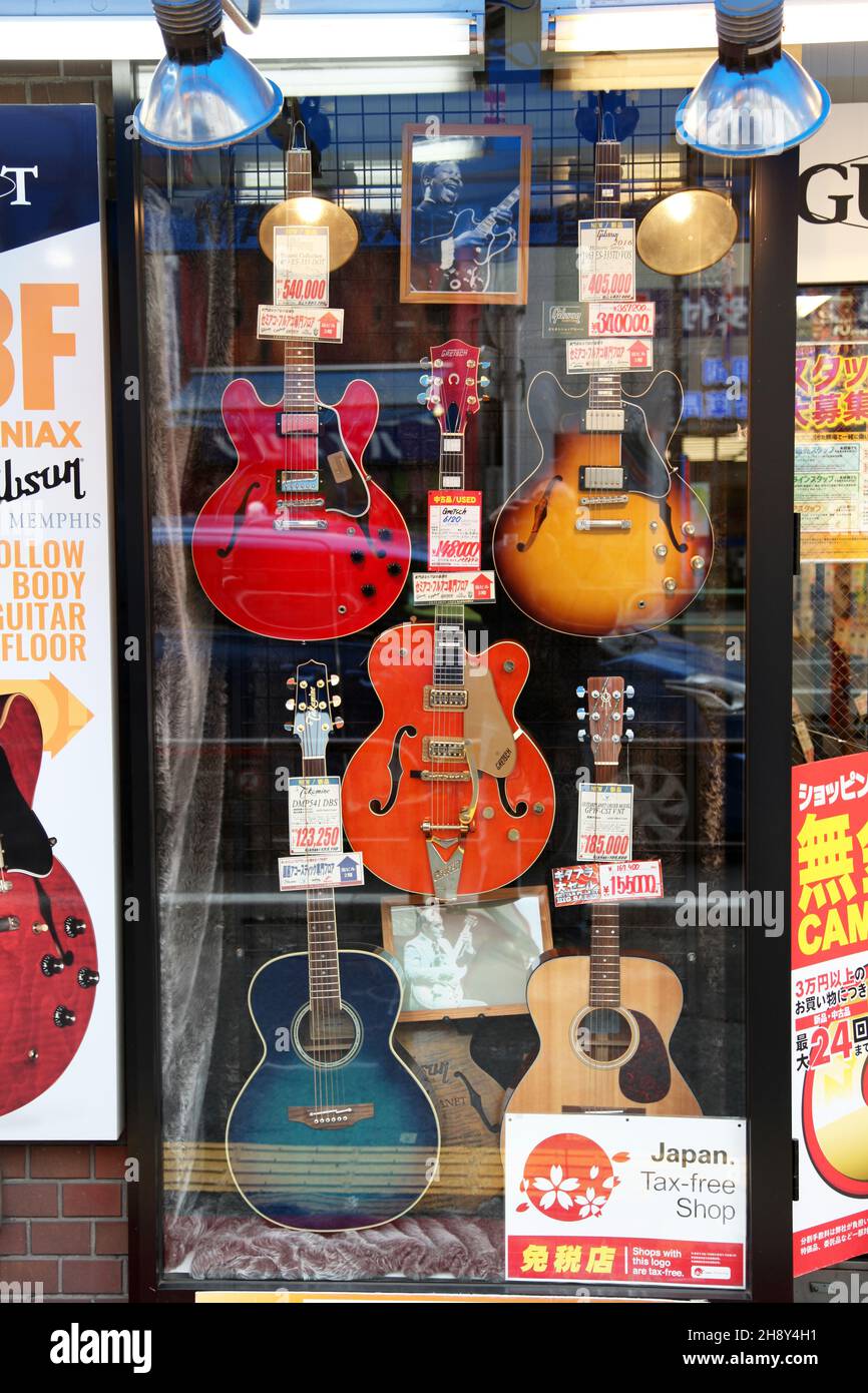 Guitar and other musical instrument shops and stores line both sides of Ochanomizu Street in