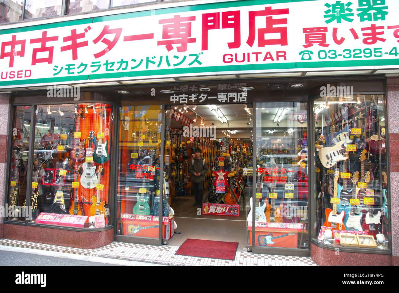 Guitar and other musical instrument shops and stores line both sides of