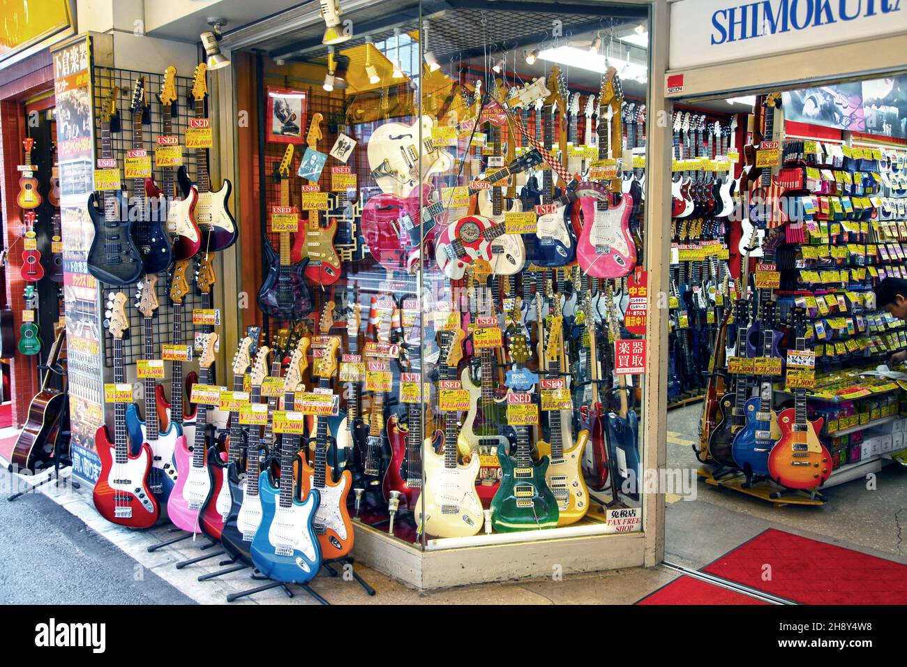 Guitar and other musical instrument shops and stores line both sides of