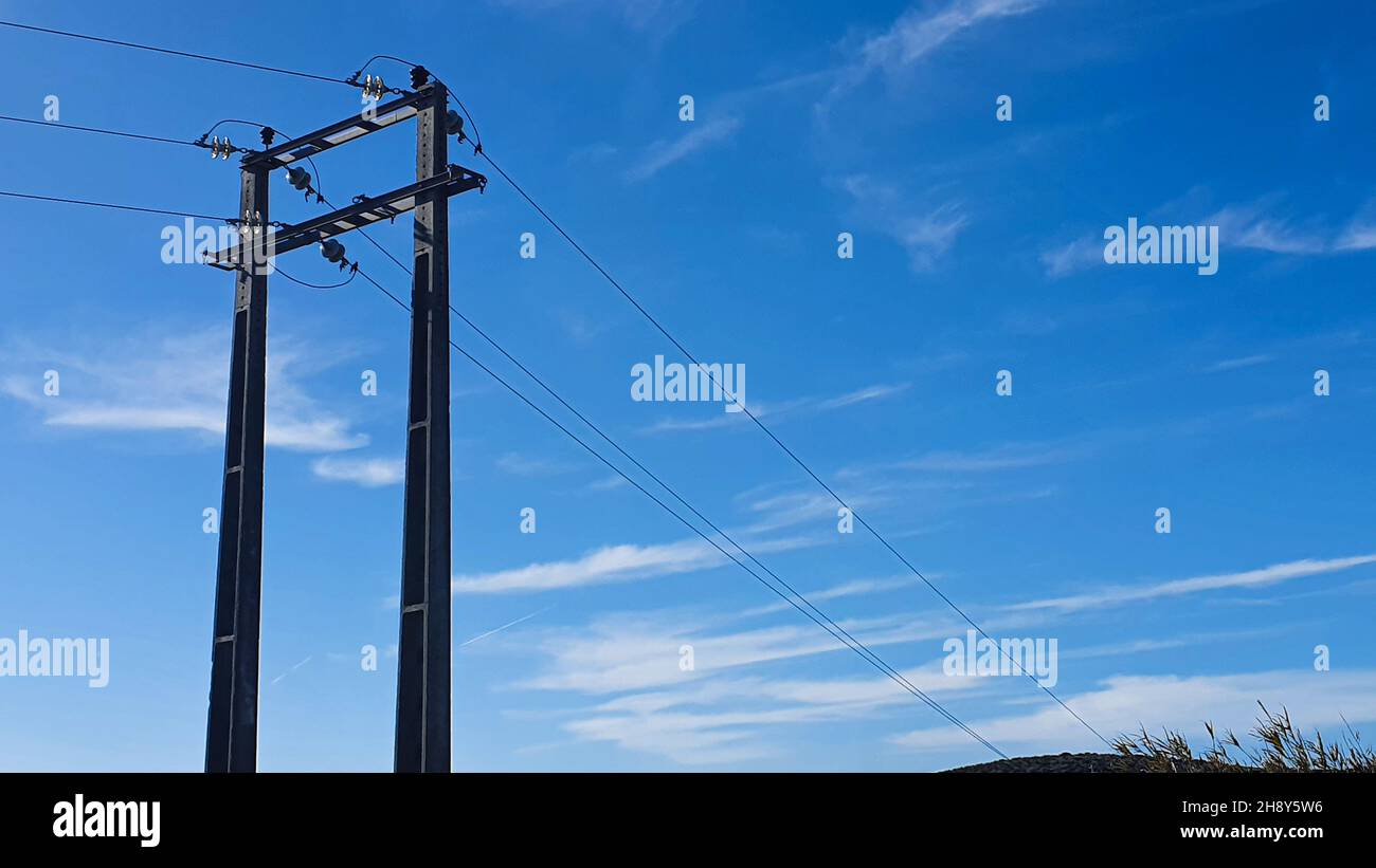 electricity pole and blue sky Stock Photo - Alamy