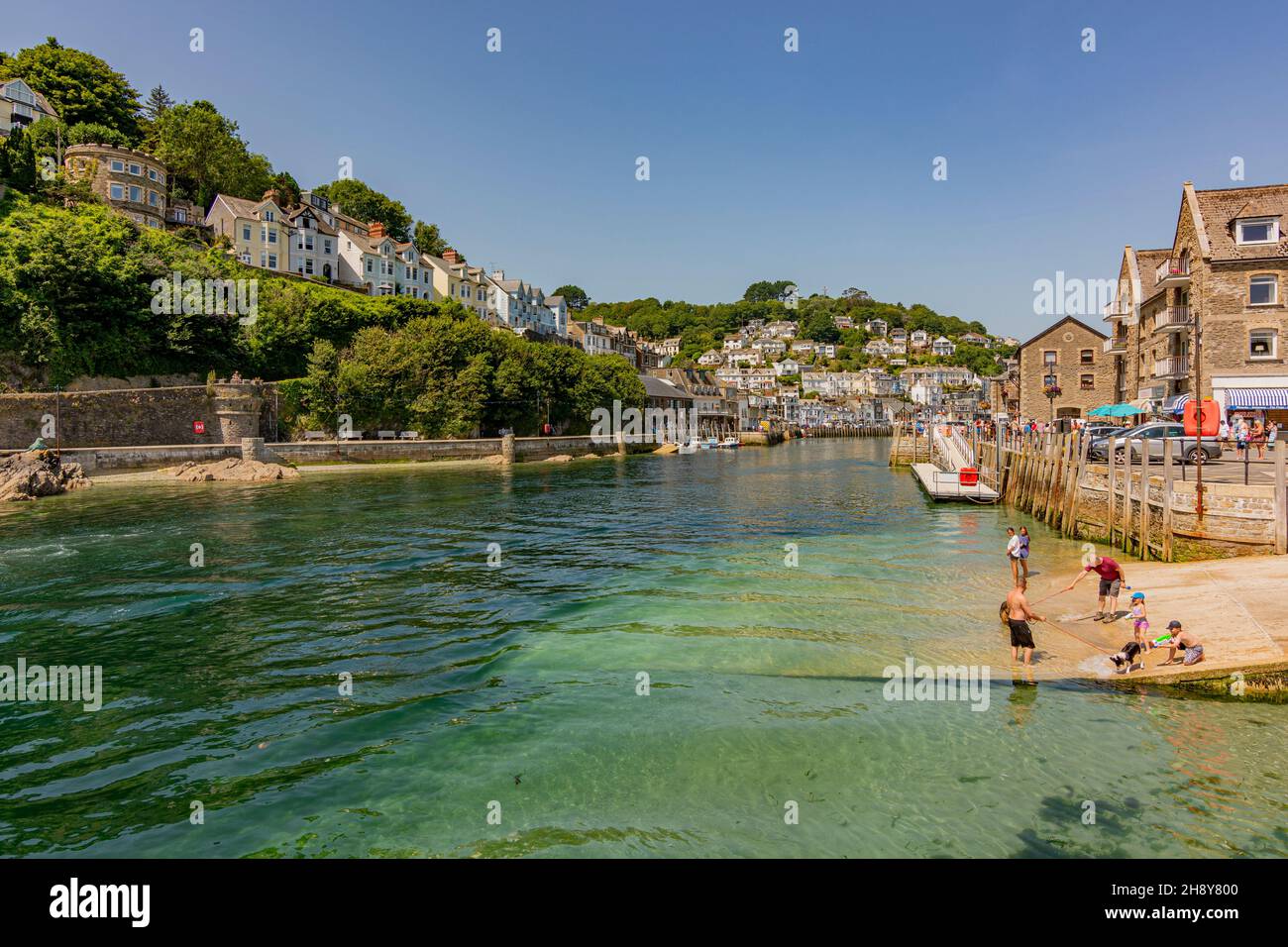 The East Looe River and West Looe just before the river flows into the sea - Looe, Cornwall, UK. Stock Photo