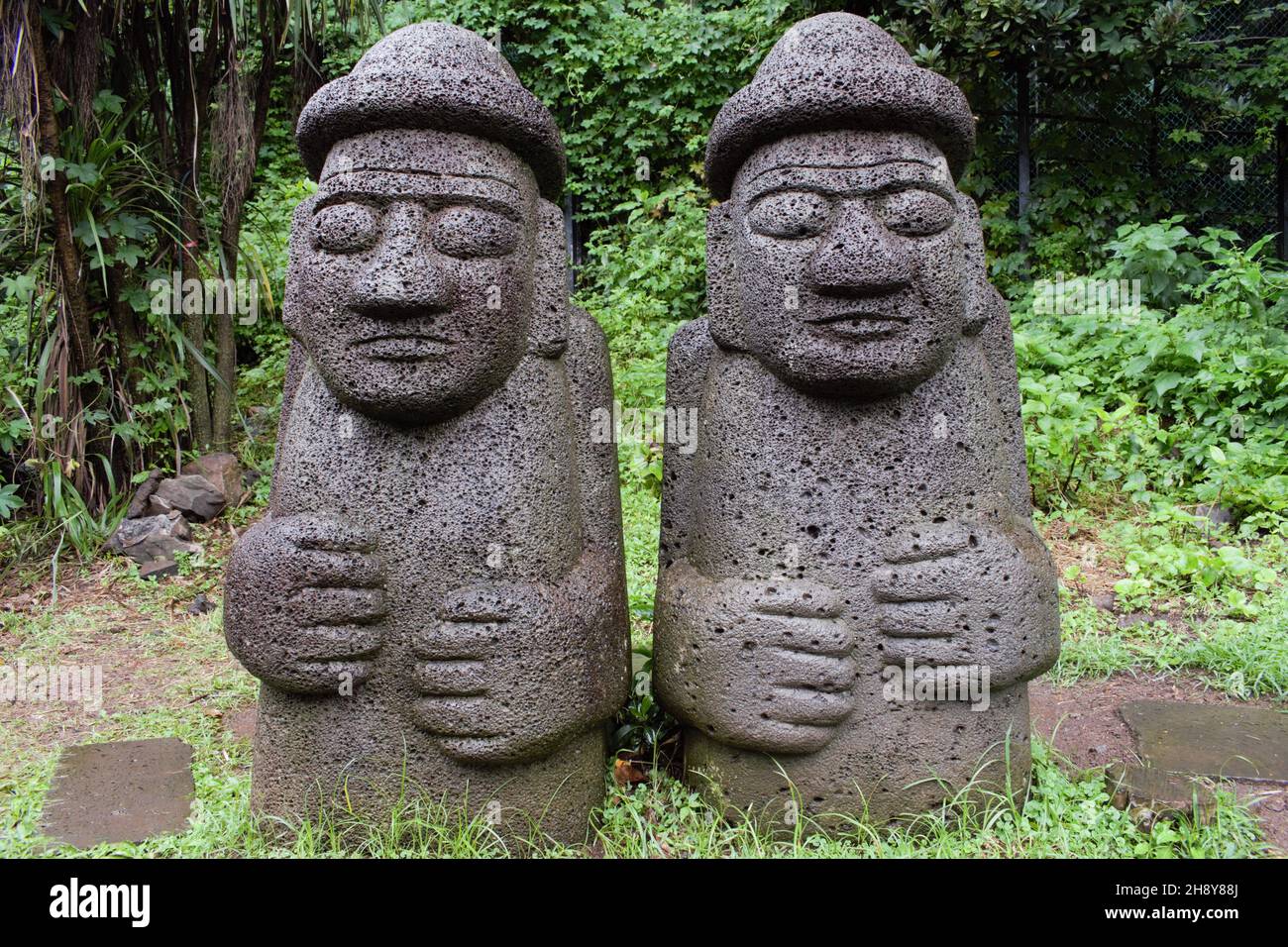 Dol hareubang rock statues in Jeju, Korea Stock Photo Alamy