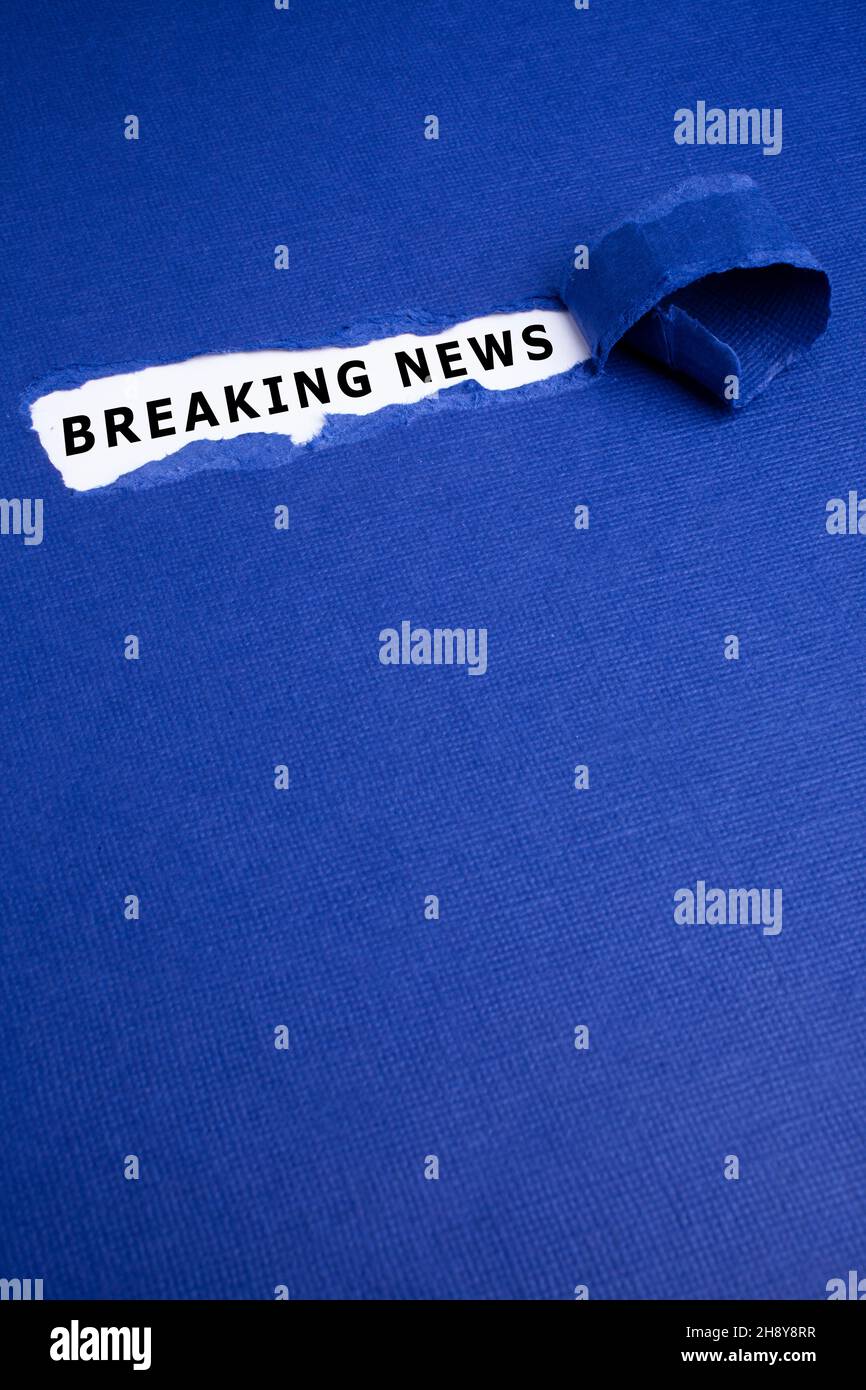 Breaking News Torn Paper Concept Stock Photo