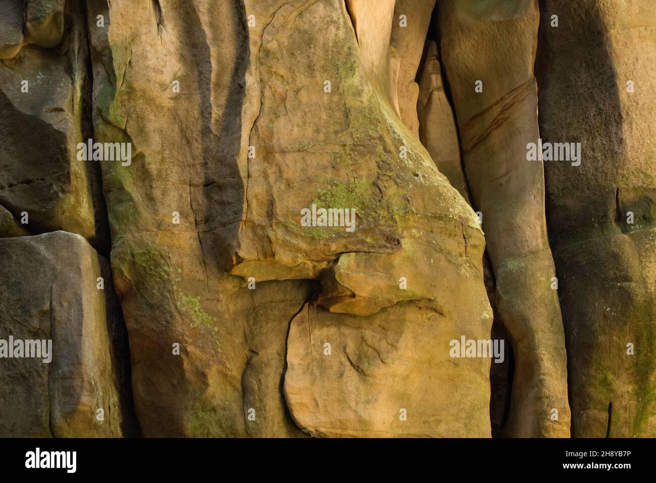 Natural walls of sandstone - rocks with deep crevices - abstract backgrounds Stock Photo