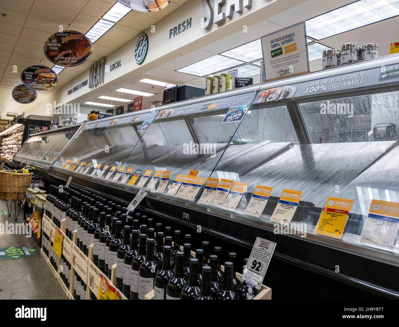 Woodinville, WA USA - circa September 2021: View of an empty seafood display case inside a Haggen grocery store Stock Photo
