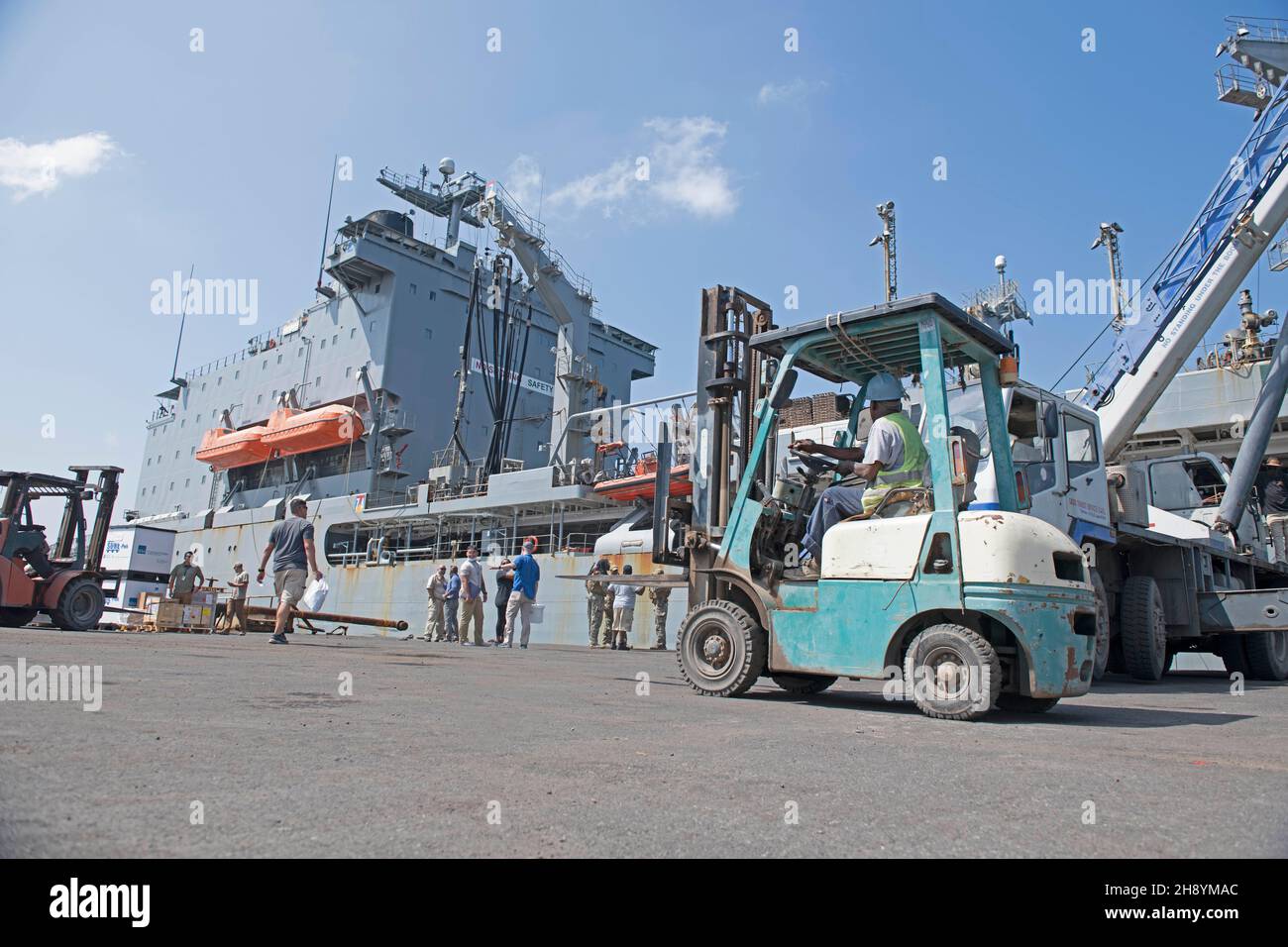 PORT OF DJIBOUTI, Djibouti (Nov. 29, 2021) – The Henry J. Kaiser-class fleet replenishment oiler USNS Kanawha (T-AO-196) sits pier side during a sustainment and logistics visit at the Port of Djibouti, Nov. 29, 2021. Kanawha is deployed to the U.S. 5th Fleet area of operations in support of naval operations to ensure maritime stability and security in the Central Region, connecting the Mediterranean and Pacific through the Western Indian Ocean and the strategic choke points. Camp Lemonnier, Djibouti serves as an expeditionary base for U.S. military forces providing support to ships, aircraft a Stock Photo
