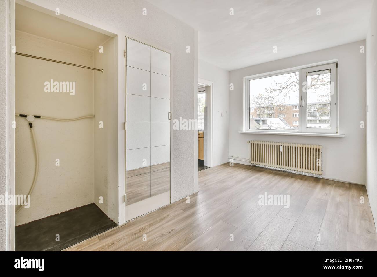A breathtaking daylight room with a large window Stock Photo - Alamy