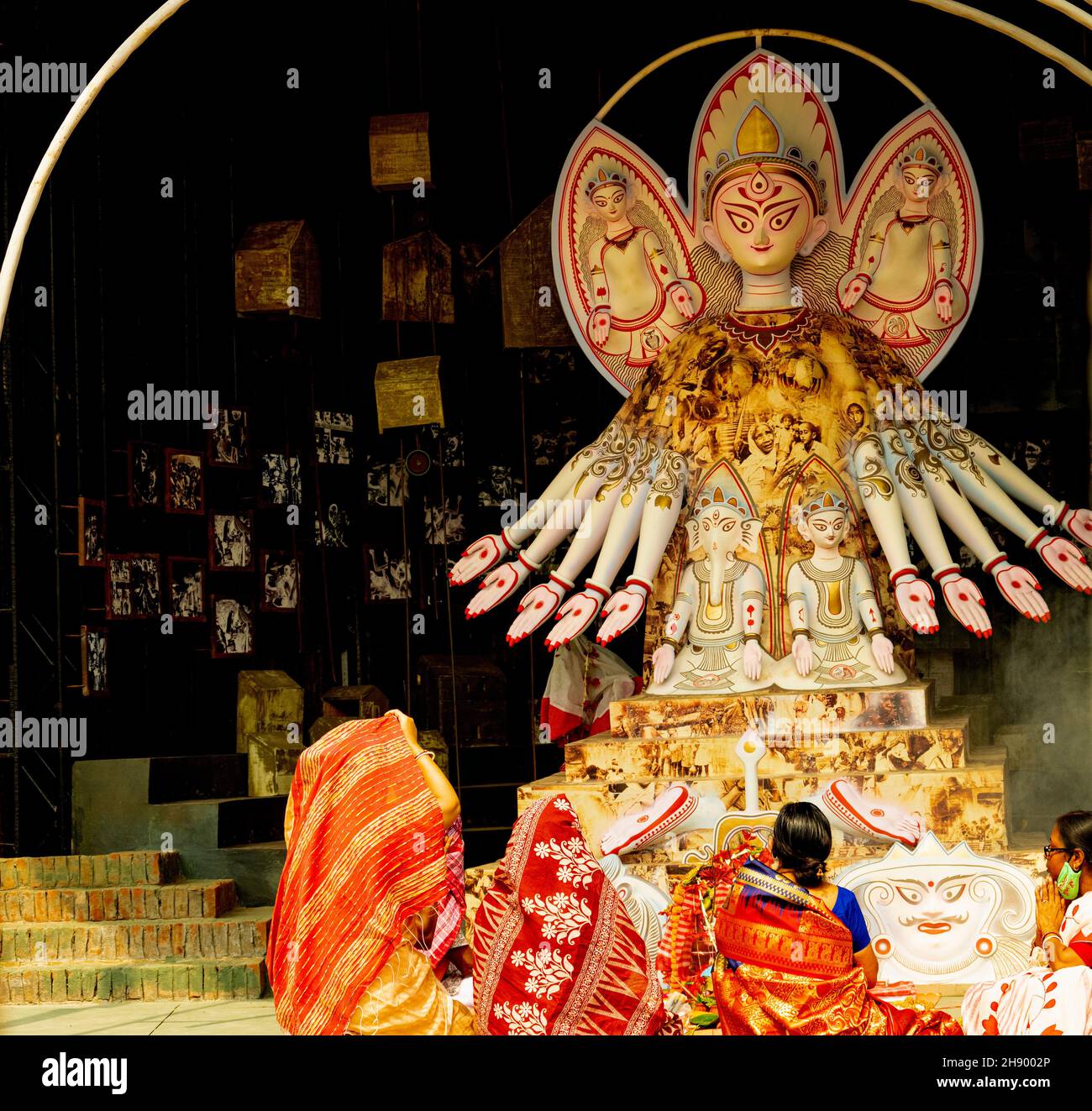 Goddess Durga,in full diviniity,,in a shadeof modern ,theme,worshipped,by Ladies,Kolkata,India. Stock Photo
