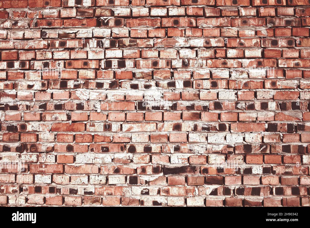 Brickwall lined with used brick, textured background with empty space for your designing. Stock Photo