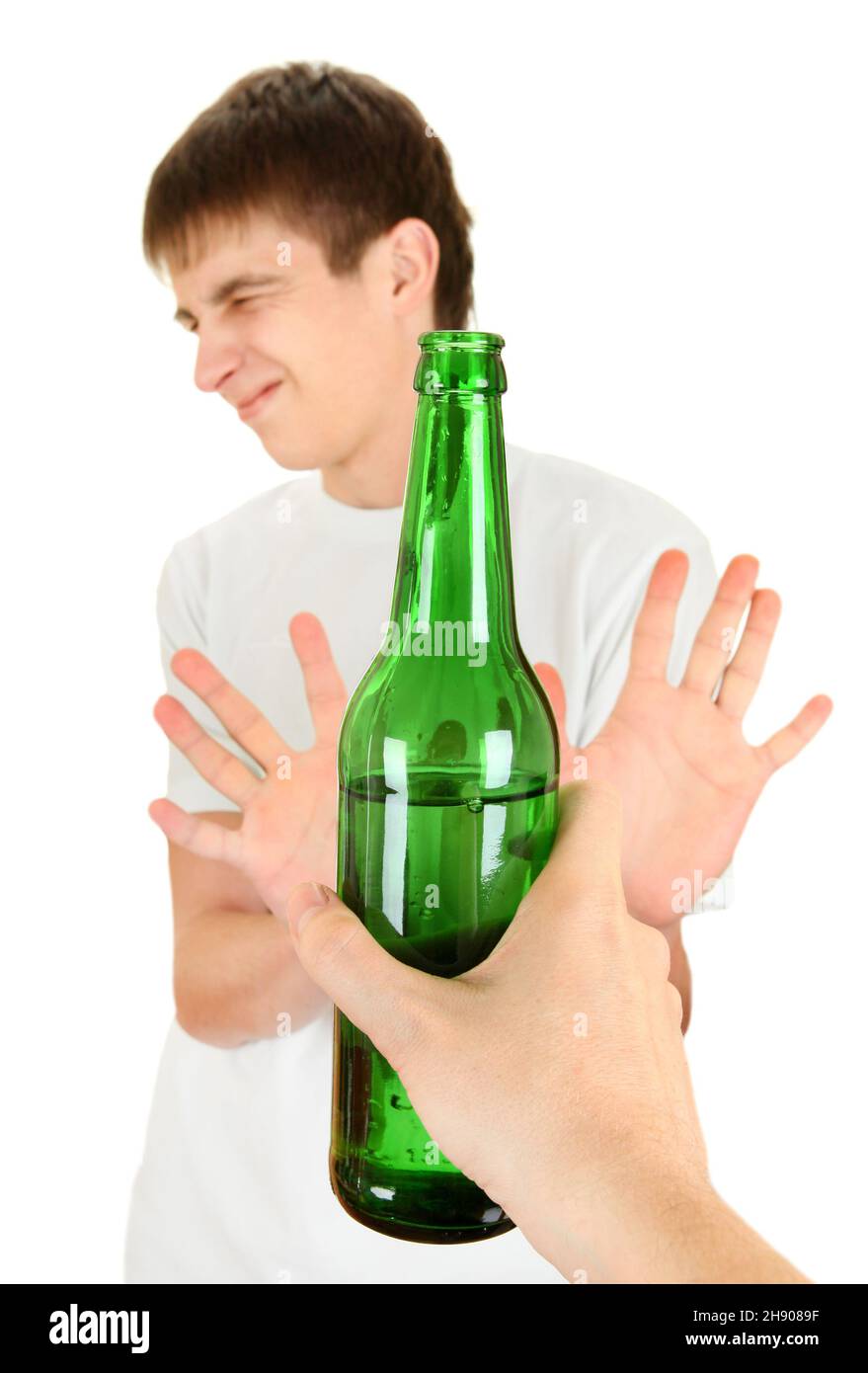 Teenager refuse a Bottle of the Beer on the White Background Stock Photo