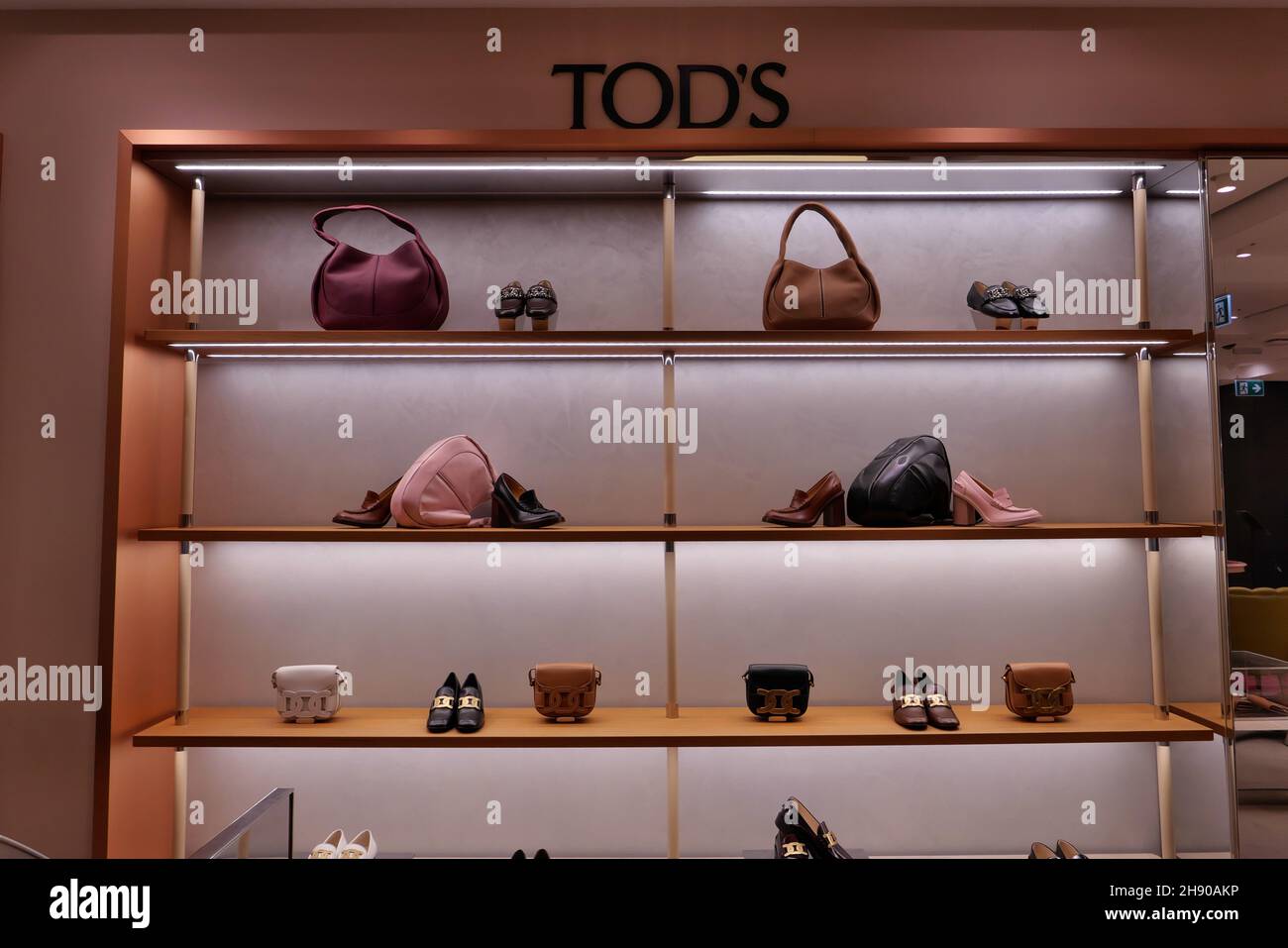 BAGS AND SHOES ON DISPLAY AT TOD'S BOUTIQUE INSIDE THE RINASCENTE FASHION  STORE Stock Photo - Alamy