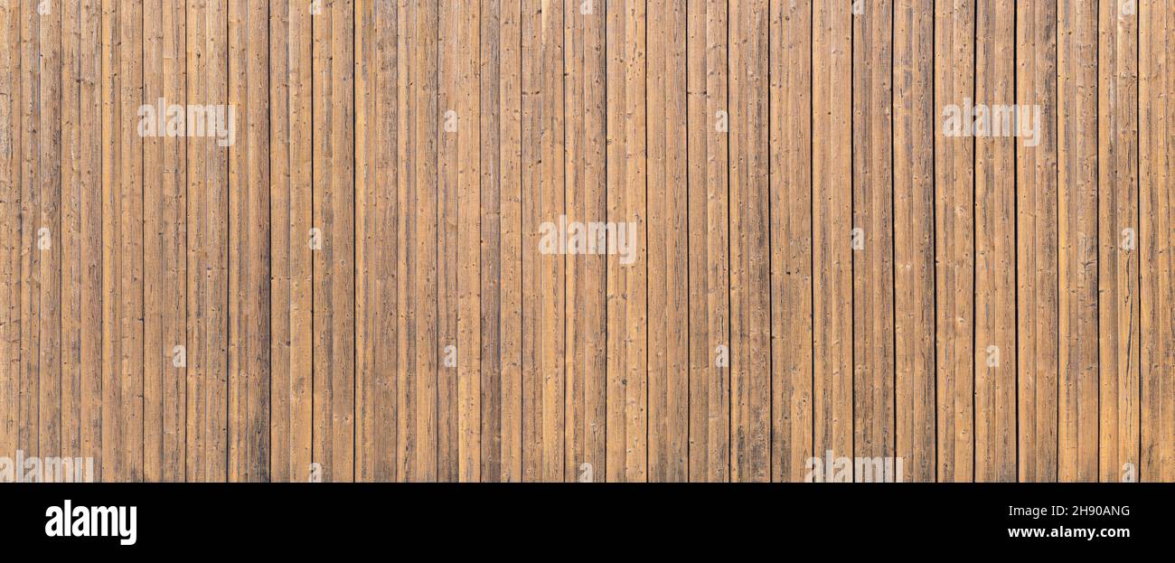 Brown, old, soiled by weathering panoramic wooden wall Stock Photo