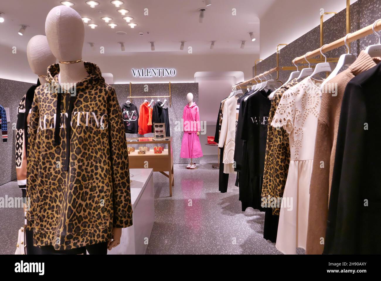 VALENTINO CLOTHING ON DISPLAY INSIDE THE FASHION STORE Stock Photo - Alamy