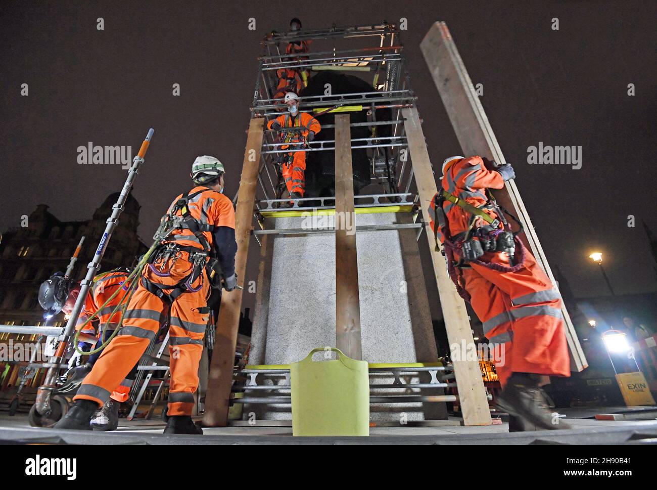 File photo dated 11/06/20 of scaffolders erecting boarding around the statue of Sir Winston Churchill in Parliament Square, London. The number of job adverts has hit a record high, with particular demand for prison officers, dentists, vets and scaffolders, according to a new report. Stock Photo