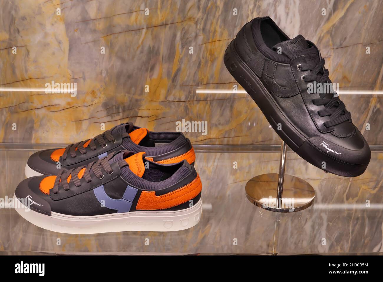 SALVATORE SHOES ON DISPLAY INSIDE THE FASHION STORE Stock -