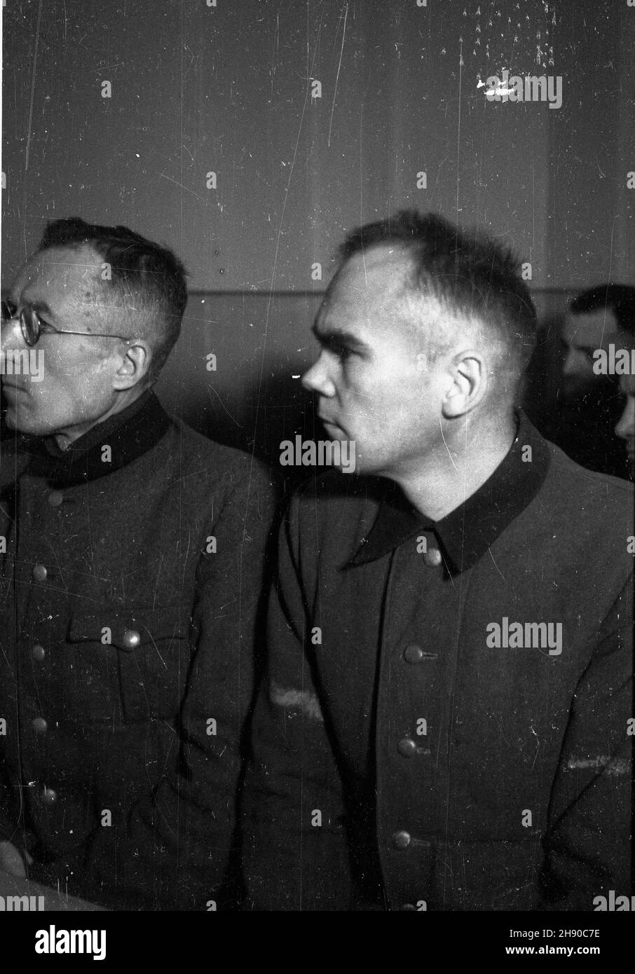 Kraków, 1947. Drugi proces zbrodniarzy oœwiêcimskich przed Najwy¿szym Trybuna³em Narodowym (25.11.1946 - 16.12 1947, og³oszenie wyroku 22.12.1947). Nz. ³awa oskar¿onych. bb/gr  PAP      Cracow, 1947. The 2nd trial of criminals from German Nazi death camp in Auschwitz before the Highest National Tribunal held between Nov. 25, 1946 and December 16, 1947. The verdict was announced on December 22, 1947. Pictured: the defendants' bench.  bb/gr  PAP Stock Photo
