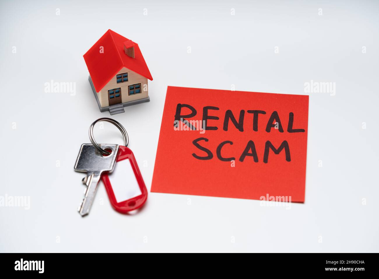 Rental Scam Fraud And Crime. Illegal Fake Home Trick Stock Photo