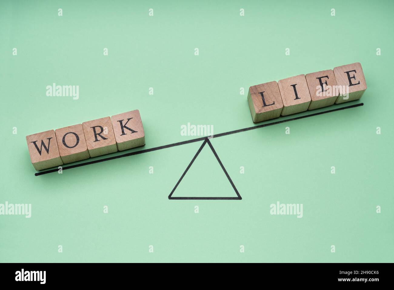 Work Life Balance On Seesaw. Business Balancing Idea Stock Photo - Alamy