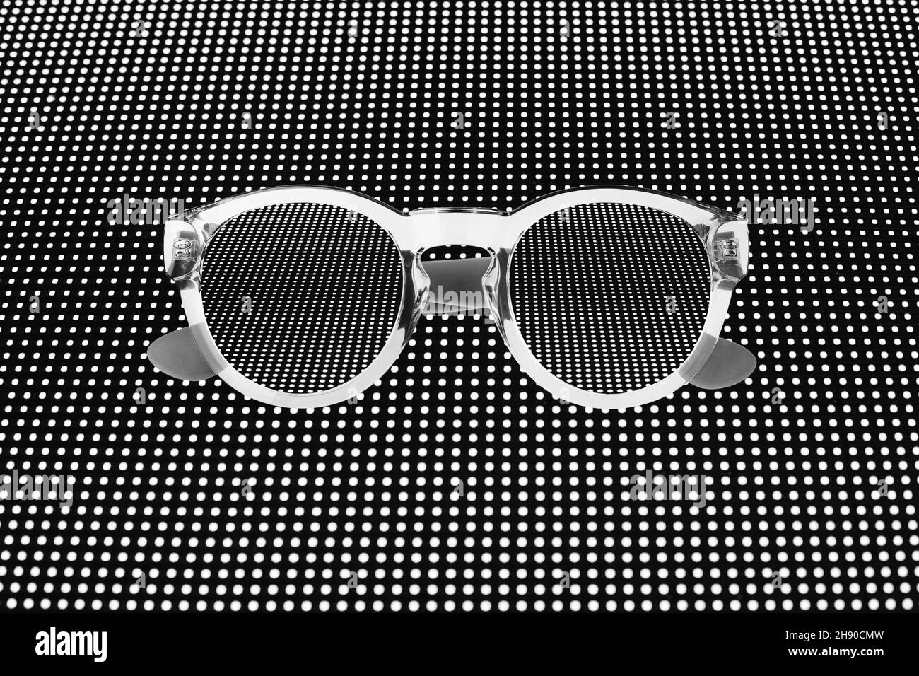 Sunglasses close up, abstract white shiny dots pattern, dark black