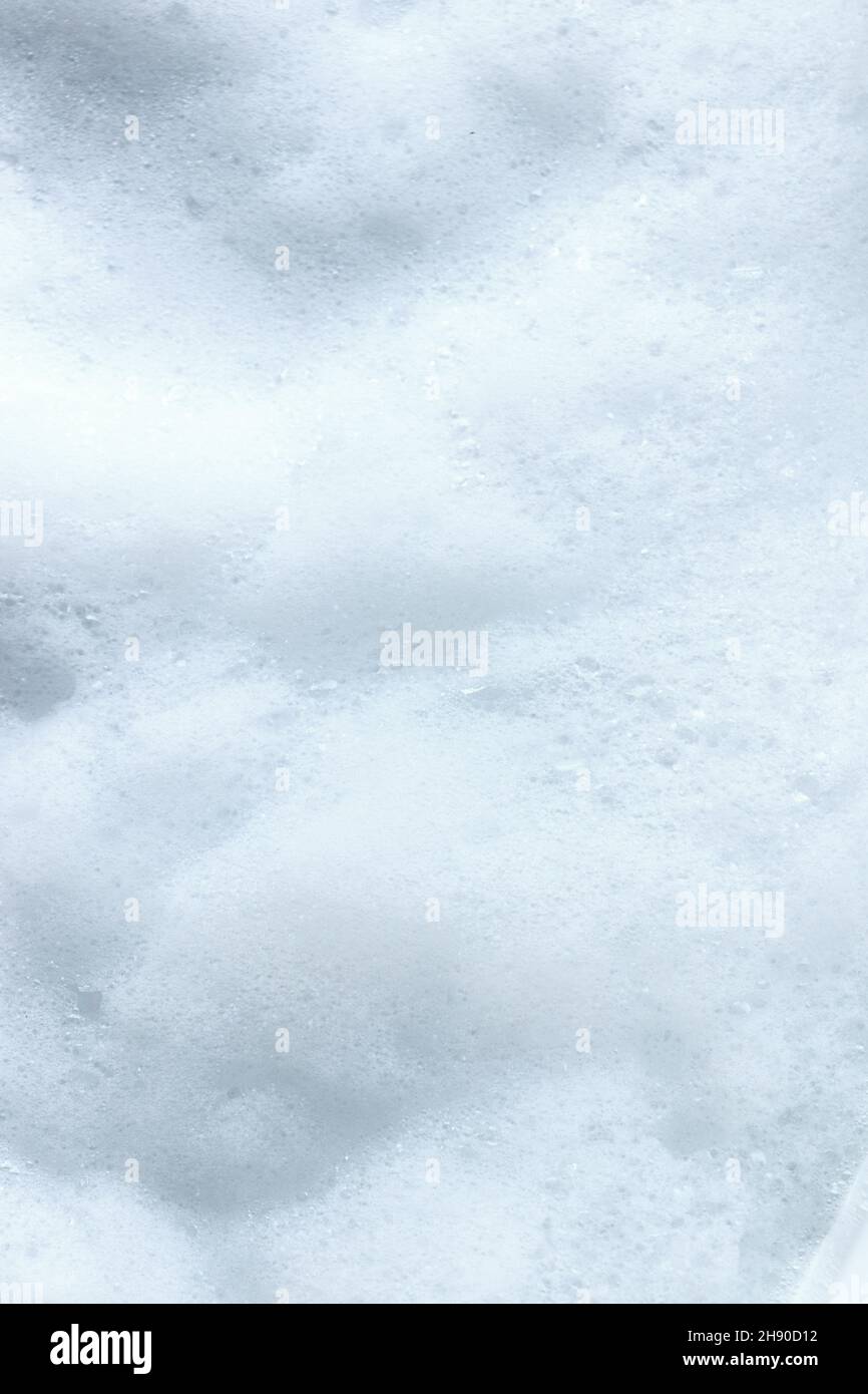 White foam bubble from soap or shampoo washing texture background. Stock Photo