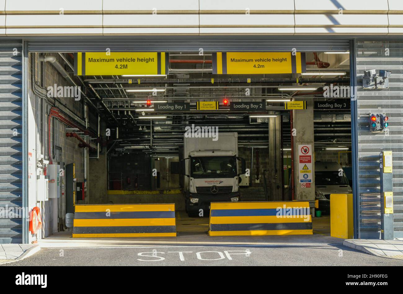 loading bay underneath a large shopping centre with height restriction
