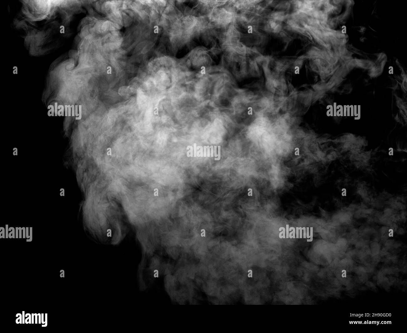 Blur white water vapour on isolated black background. Abstract of steam  with copy space. Steam flow. Smoke on white background. Stock Photo