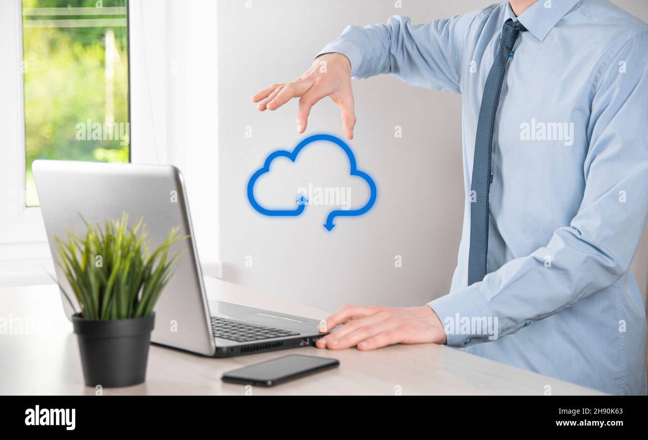 Business man holding icon cloud computing network and icon connection data information in hand. Cloud computing and technology concept Stock Photo
