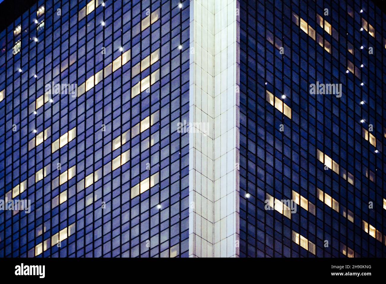 Glass office builing at nght - close-up Stock Photo