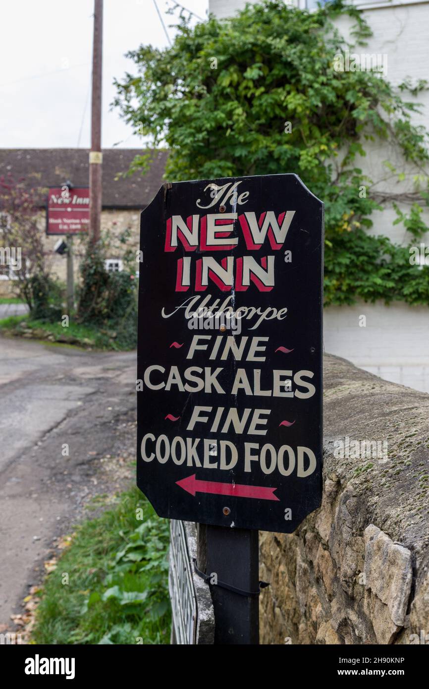 Pub sign for the New Inn, a hostelry in the village of Abthorpe, Northamptonshire, UK Stock Photo