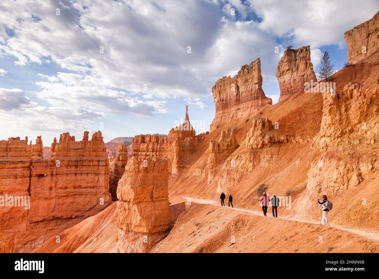 21 April 2014: Bryce Canyon, Utah, USA - Visitors on a walking trail in Bryce Canyon National Park, Utah, on a Spring morning. Stock Photo