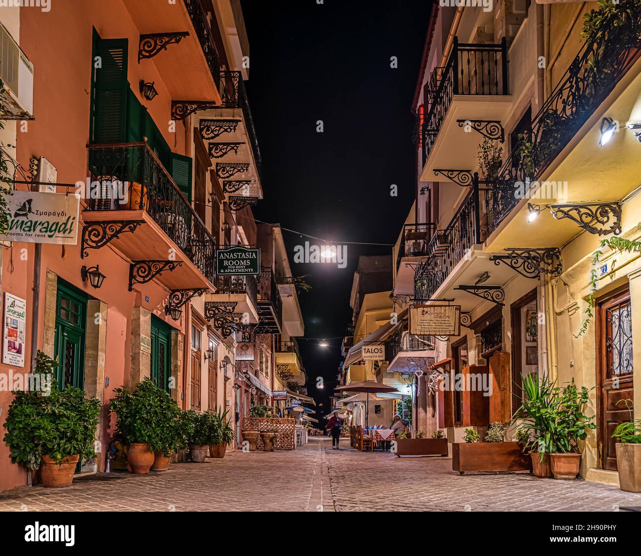 Illuminated Street with hotels and restaurants in the old town of Chania, Crete, Greece, October 16, 2021 Stock Photo