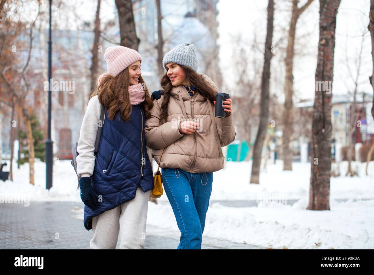 Two girls models walking hi-res stock photography and images - Alamy