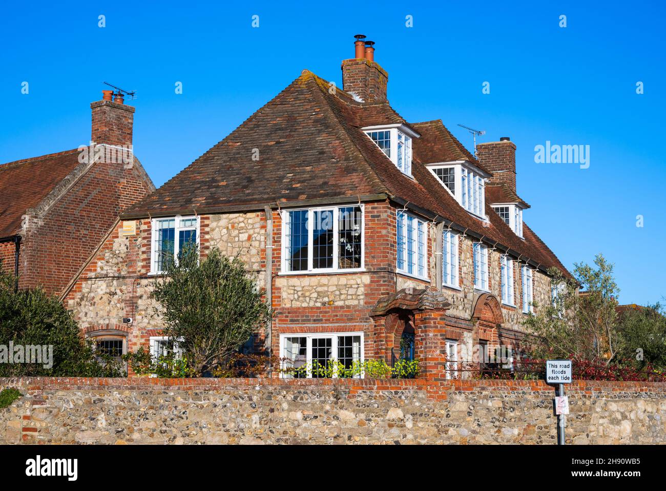 Chandler's House, The Old Town Hall, 1694, in William and Mary style, now a waterfront home on Shore Road in Bosham Village, West Sussex, England, UK. Stock Photo