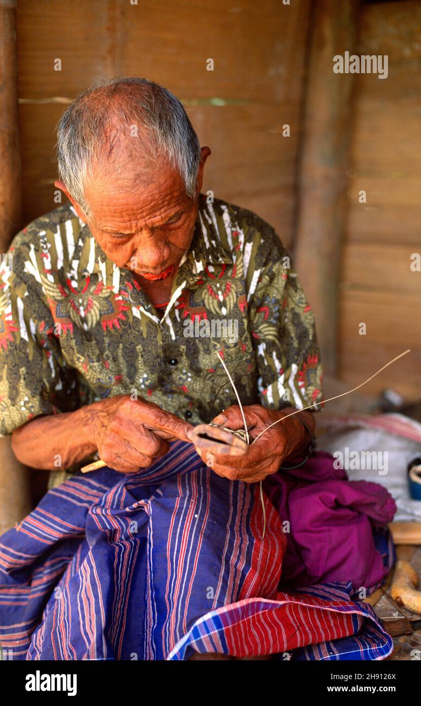 Batak craftsman. Ambarita, Samosir Island, Lake Toba, Sumatra, Indonesia. Stock Photo