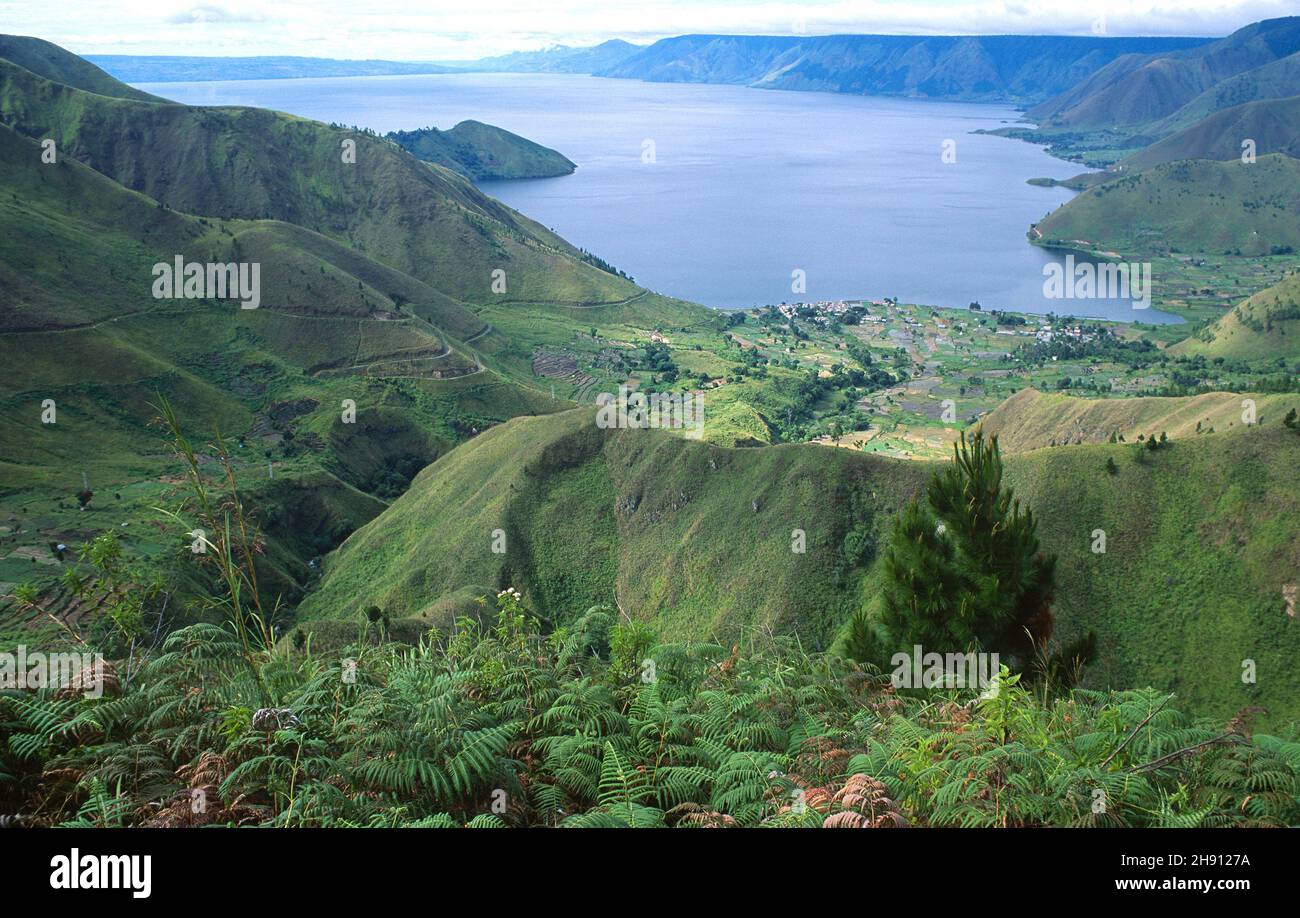 Lake Toba occupies the caldera of a supervolcano (the largest in the world). Sumatra, Indonesia. Stock Photo