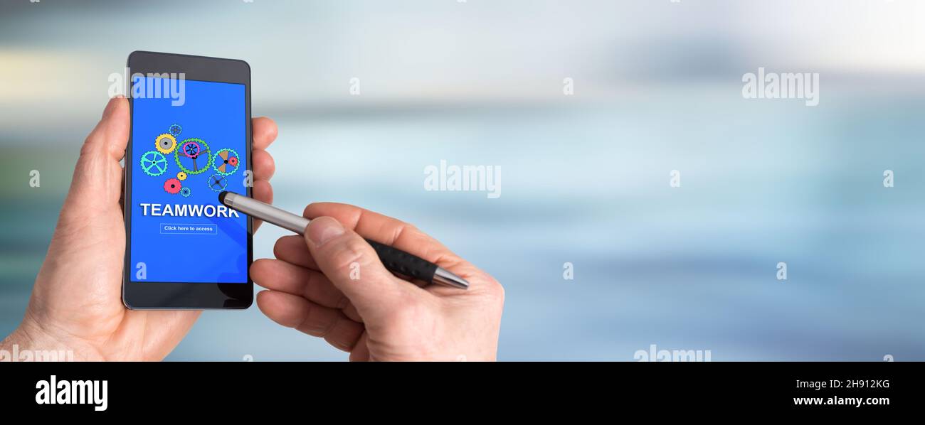 Smartphone screen displaying a teamwork concept Stock Photo - Alamy