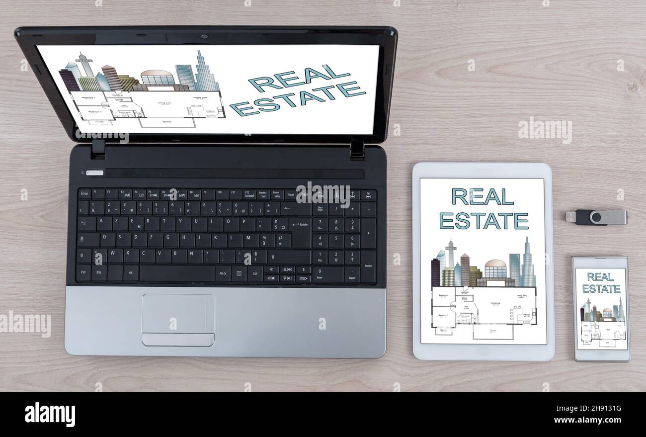 Real estate concept shown on different information technology devices Stock Photo