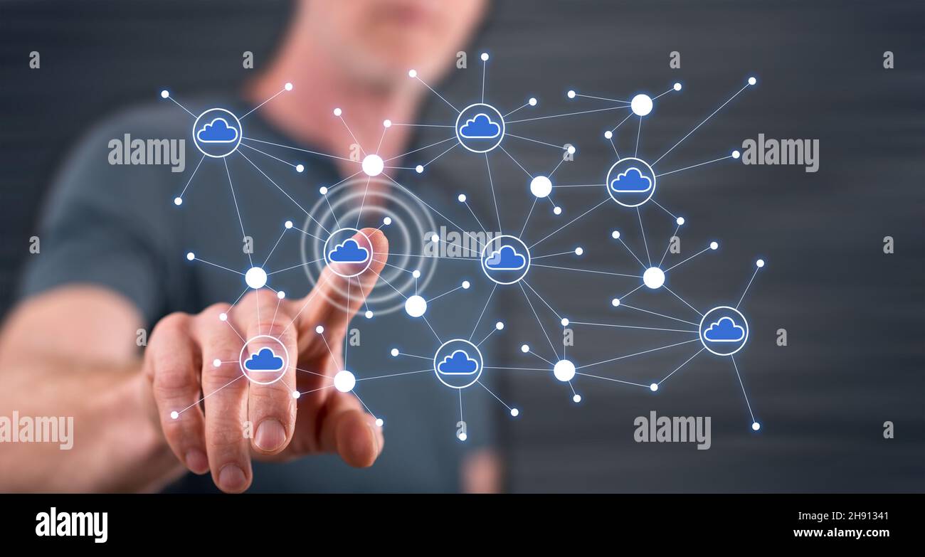 Man touching a cloud networking on a touch screen with his finger Stock ...