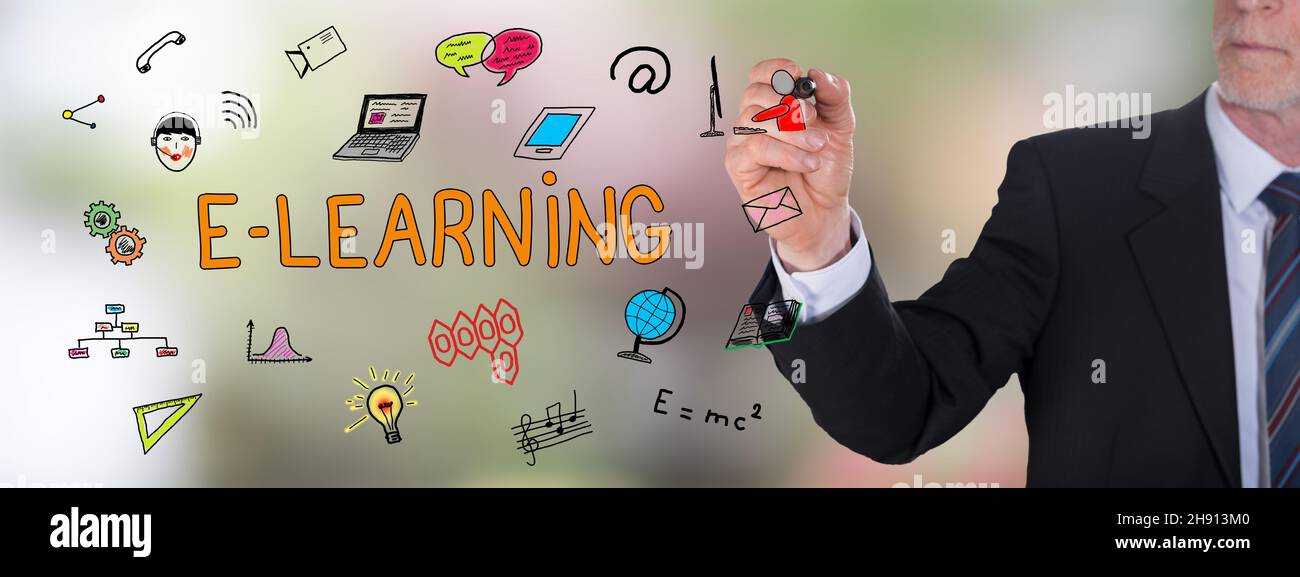 Businessman drawing an e-learning concept Stock Photo
