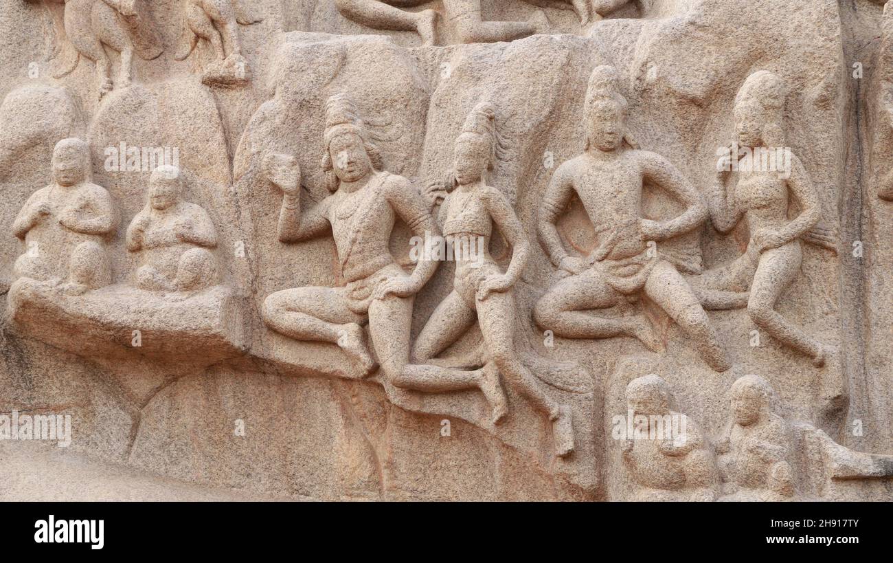 Sculptures carved in rock. The rock is located in the background Stock Photo