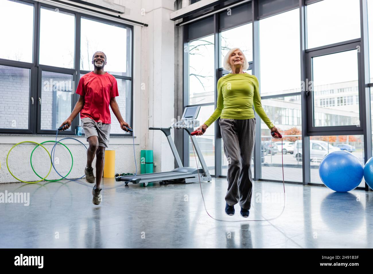 Senior woman jumping rope hi-res stock photography and images - Alamy