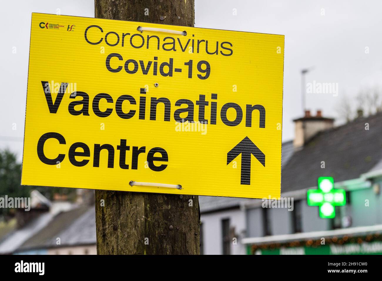 Bantry, West Cork, Ireland. 3rd Dec, 2021. A COVID-19 Vaccination Centre sign outside a chemist shop in Bantry, West Cork. The COVID booster campaign is gaining momentum with the 60-69 cohort currently receiving their jabs. Credit: AG News/Alamy Live News Stock Photo